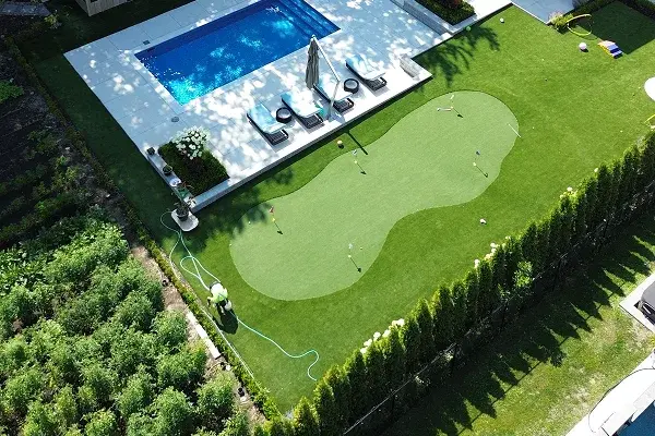 Artificial turf installation for backyard putting green Ontario