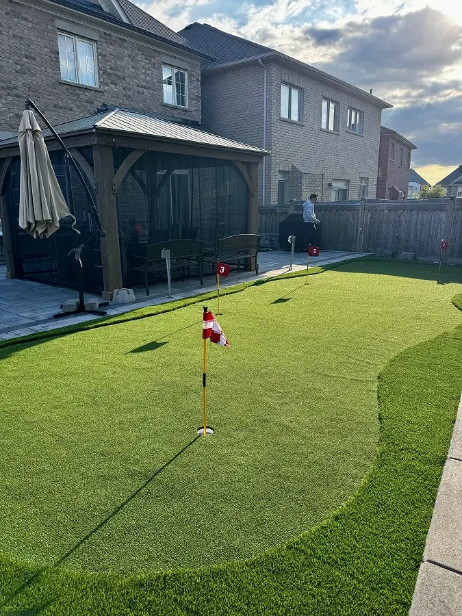 Residential backyard artificial turf installation Ontario