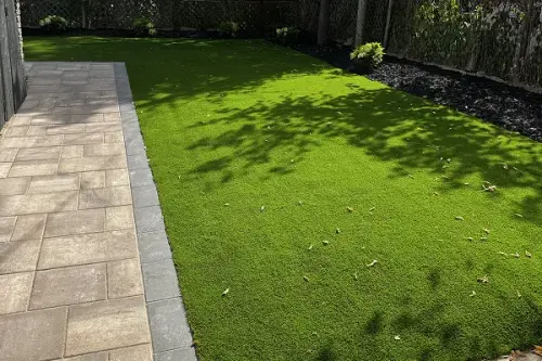 Backyard artificial turf lawn installation Toronto